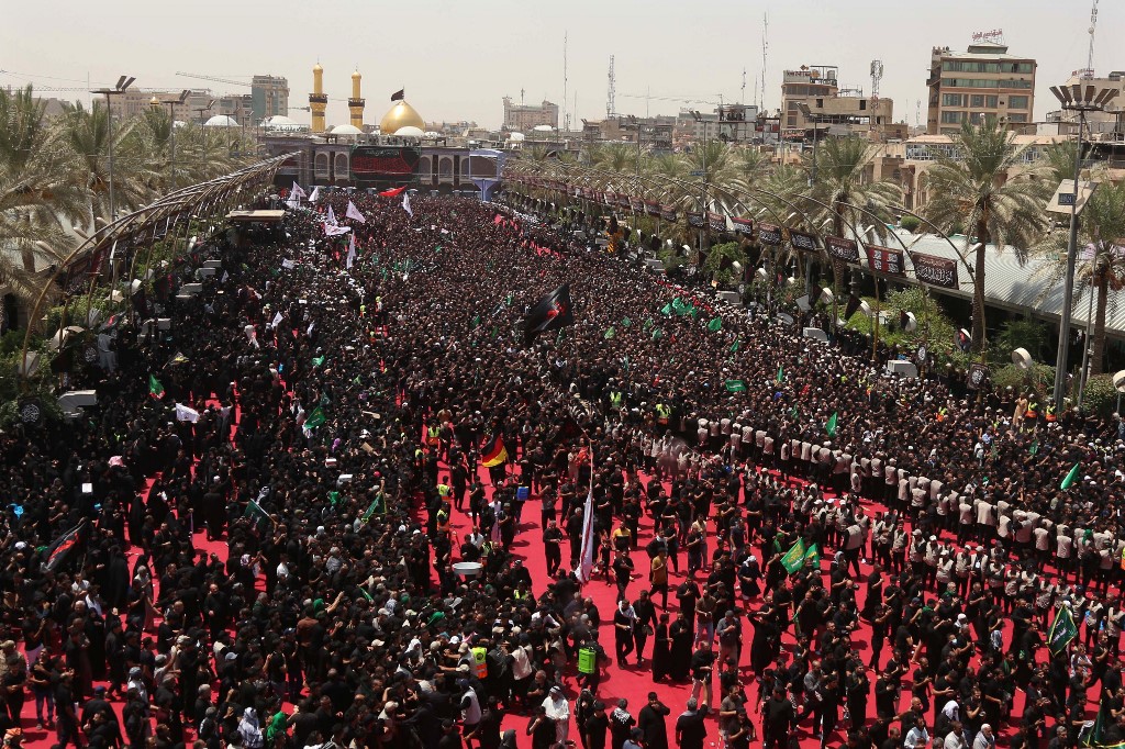 Shiite Muslims take part in the 