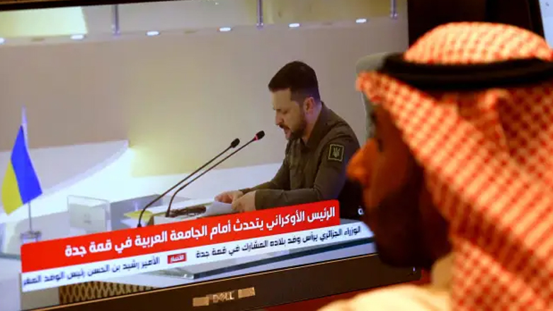 Media delegates watch Ukraine’s President Volodymyr Zelenskyy addressing the Arab League Summit in Jeddah, May 19, 2023. (Photo: Fayez Nureldine/AFP)