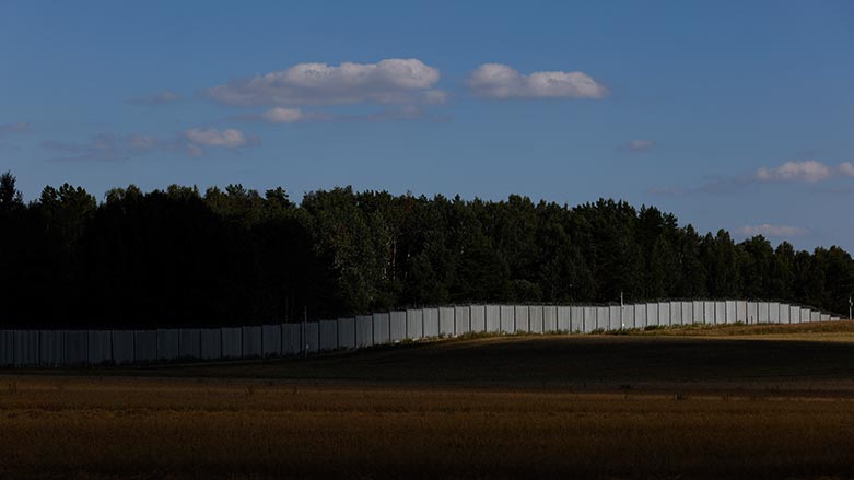 A metal wall on the border between Poland and Belarus, in Jurowlany, Poland. (Photo: Michal Dyjuk/ AP)