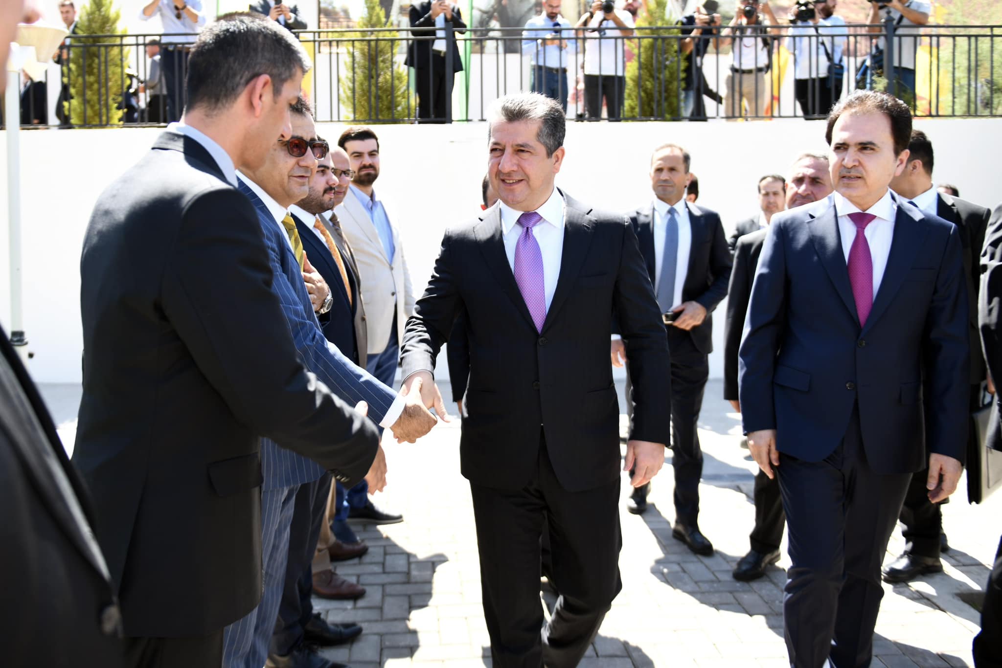 KDP Vice President Masrour Barzani (center) shaking hands with his party's officials in Duhok, August 14, 2023. (Photo: Barzani's office)