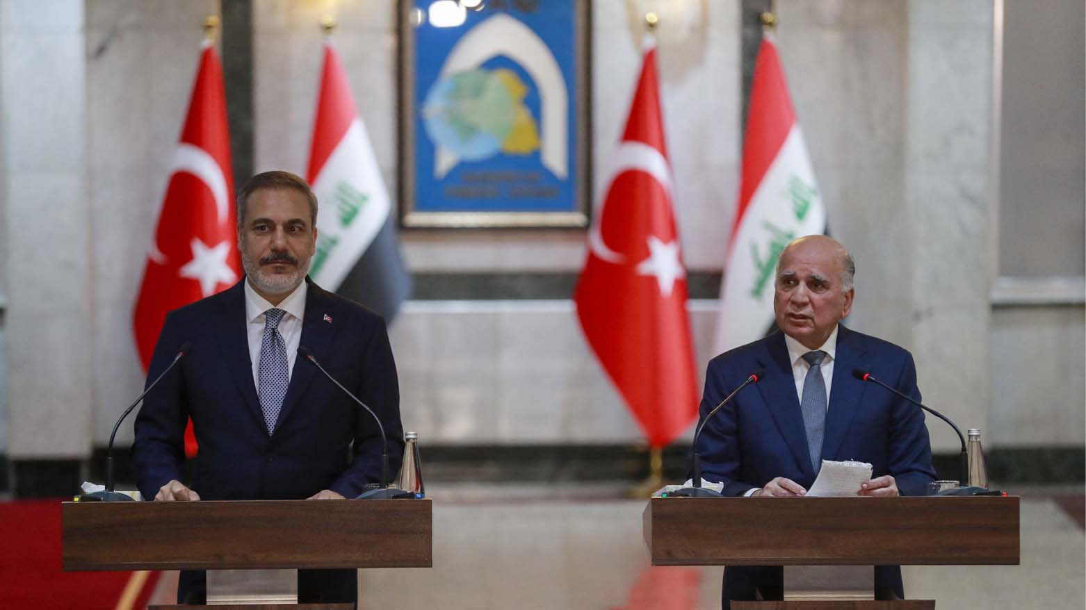 Iraq's Foreign Minister Fuad Hussein (R) speaks during a joint press conference with Turkey's Foreign Minister Hakan Fidan in Baghdad, Aug. 22, 2023. (Photo: Ahmad Al-Rubaye/AFP)