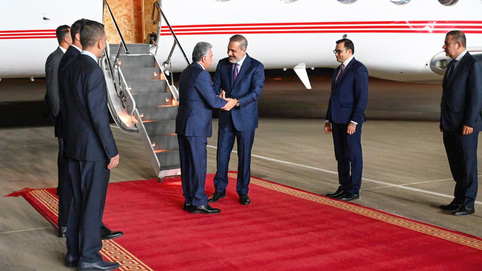 Turkish Minister of Foreign Affairs Hakan Fidan (top right) shaking hands with Kurdistan Region's Minister of Interior Reber Ahmed in Erbil, August 24, 2023. (Photo: KRG)