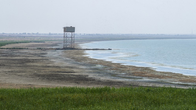 A picture shows the receding waterline of the Habbaniyah lake affected by severe drought in Iraq's Anbar province, August 11, 2023. (Photo: Murtadha Ridha/AFP)