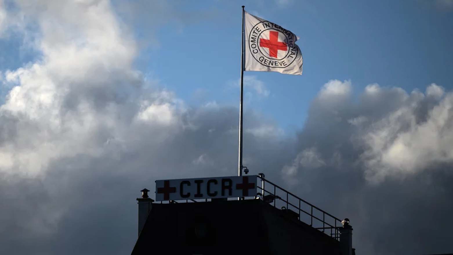 A flag of the International Committee of the Red Cross flutters above the humanitarian organization's headquarters in Geneva, Sept. 29, 2021. (Photo: Fabrice Coffrini/AFP)