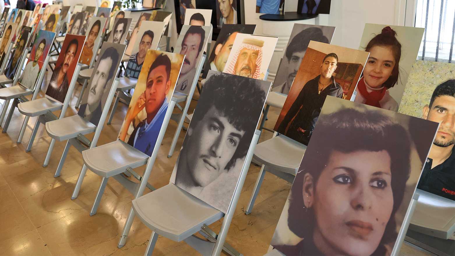 Portraits of people forcibly disappeared in Iraq, Lebanon, Syria, and Yemen are displayed during an event organized by Amnesty International and attended by their family members in Beirut, Aug. 30, 2023. (Photo: Anwar Amro/ AFP)