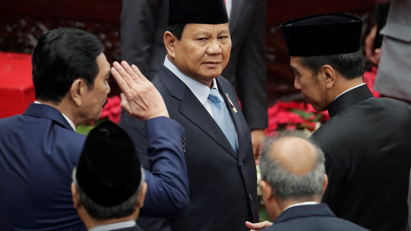 (Photo by Bagus INDAHONO / POOL / AFP)