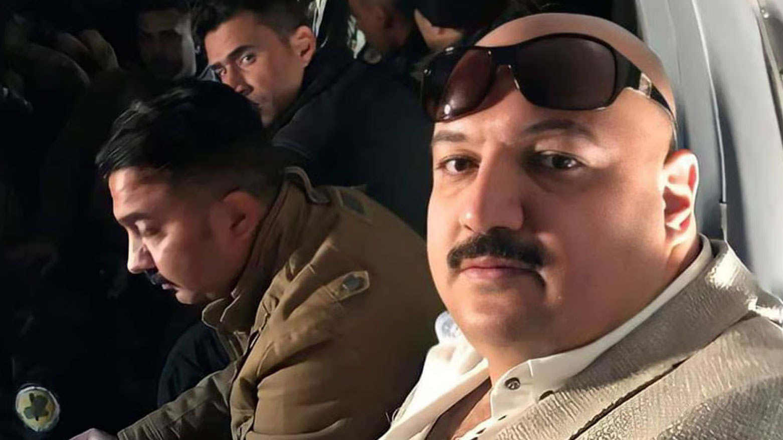 Nour Zuhair (R), the prime suspect of the infamous 'Theft of the Century'. (Photo: Iraqi Media)