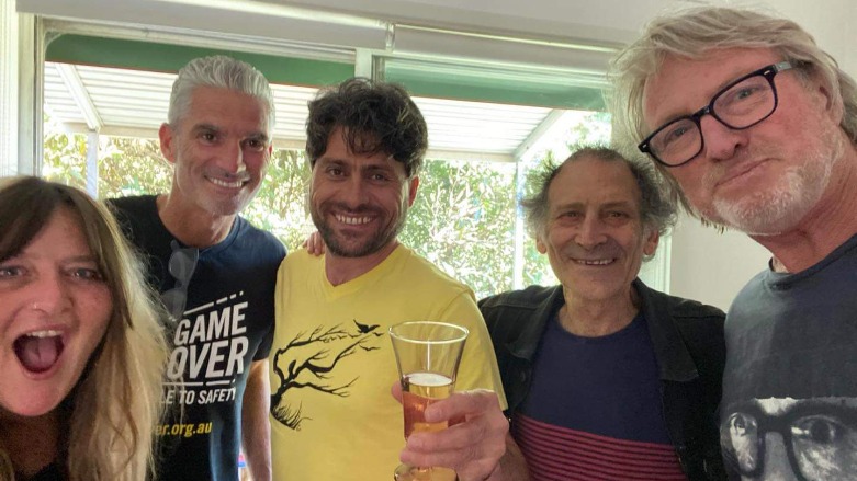 Bandesh celebrating his birthday with refugee rights advocate Craig Foster and his friends after his release. (Photo: Twitter/Farhad Bandesh)