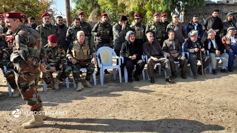 Officials and members of Peshmerga forces inside Lheban village, Dec. 6, 2021. (Photo: Hemin Dalo/Kurdistan 24)