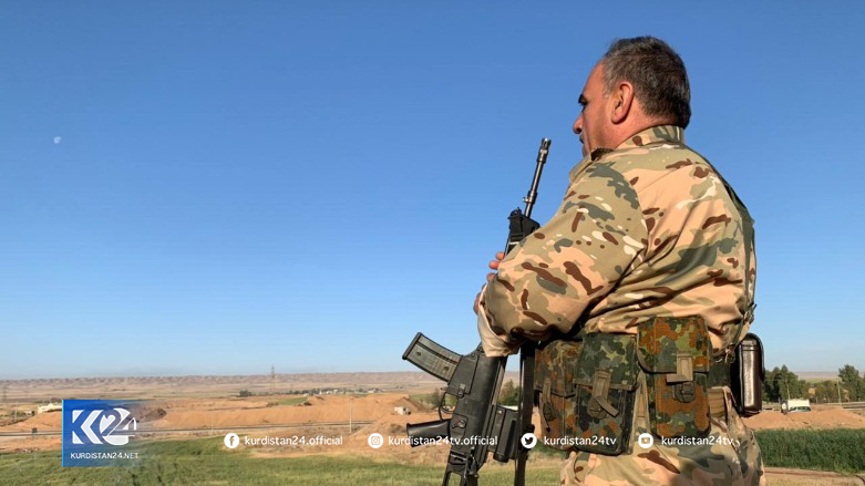 A Peshmerga fighter stands guard in one of Iraq's disputed territories. (Photo: Kurdistan 24)