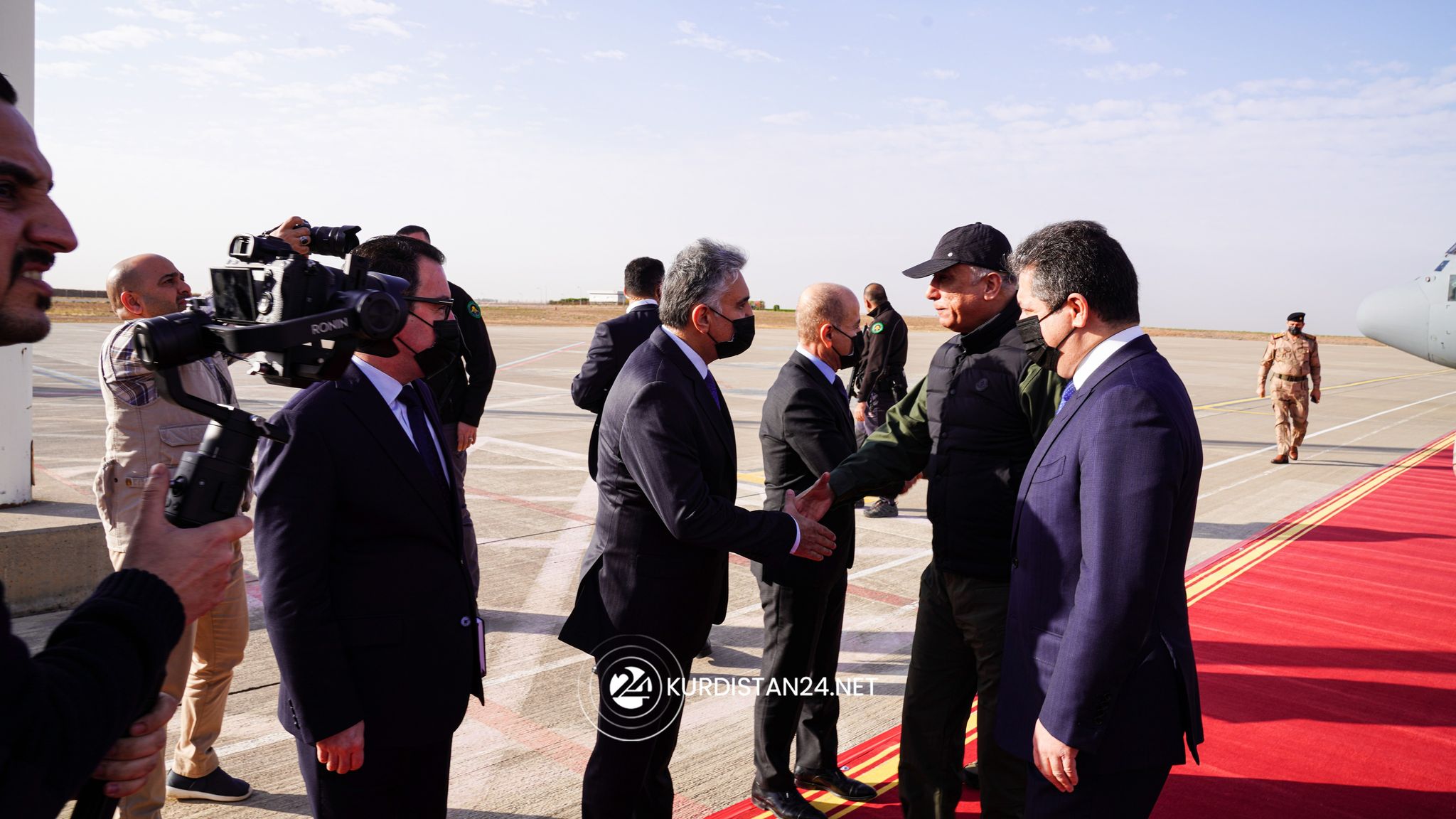 Iraq's PM Mustafa al-Kadhimi shakes hands with Kurdistan Region Minister of Interior Rebar Ahmed, Erbil, Dec. 8, 2021. (Photo: Handout/KRG)