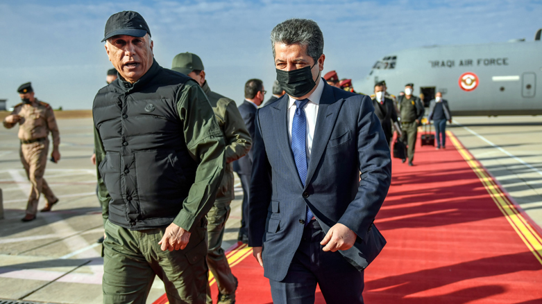 PM Masrour Barzani (right) receives his Iraqi counterpart Mustafa al-Kadhimi at Erbil International Airport early on Wednesday, Dec. 8, 2021. (Photo: Handout/KRG)