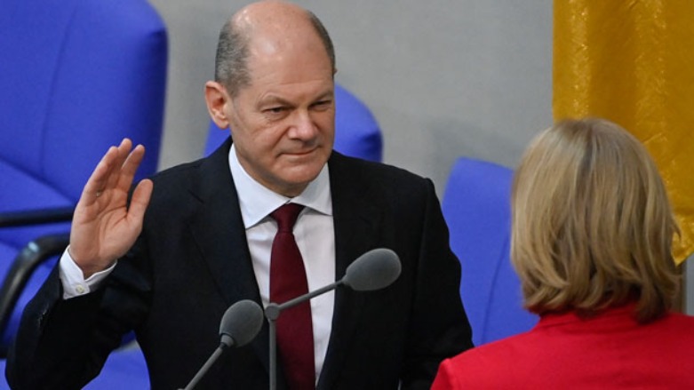 German Chancellor Olaf Scholz takes the oath from President of the Bundestag in Berlin, Dec. 8, 2021.  (AFP)