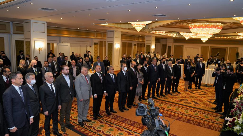 Attendees stand as the Romanian National Anthem is played during Great Union Day celebration in Erbil, Dec. 8, 2021. (Photo: Romanian Consular Office in Erbil)
