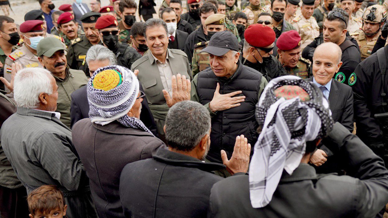 Iraqi Prime Minister Mustafa al-Kadhimi (center) speaks with Lheban village residents, who recently fended off an ISIS attack, Dec. 8, 2021. (Photo: Iraqi Government)