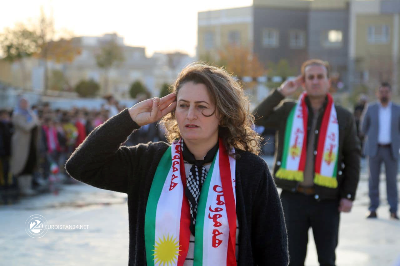 Teachers at a school salute the Kurdistan flag to mark Kurdistan Flag Day, Dec. 16, 2021. (Photo: Dana Hama Gharib/Kurdistan 24)