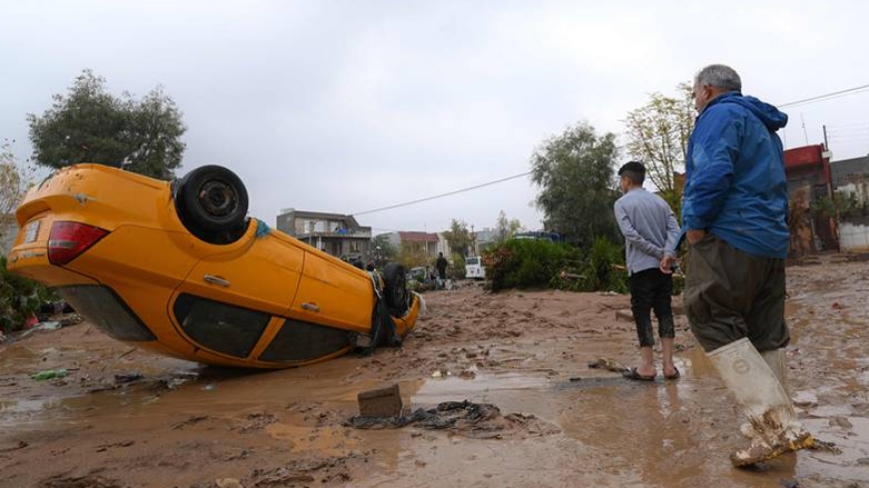 A car overturned due to the flash flood that hit Erbil on early Friday morning. (Photo: social media)