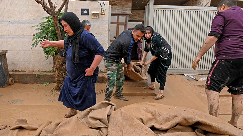 دیمه‌نێكی زیانبه‌ركه‌وتووانی لافاوه‌كه‌ی رۆژی هه‌ینی (17ی كانوونی یه‌كه‌م/ دیسه‌مبه‌ری 2021)ی هه‌ولێر، فۆتۆ: فرانس پرێس