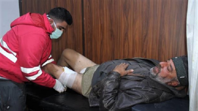 A civilian injured by shelling is treated by a doctor outside the northeastern Syrian town of Tal Tamir. (Photo: SDF)