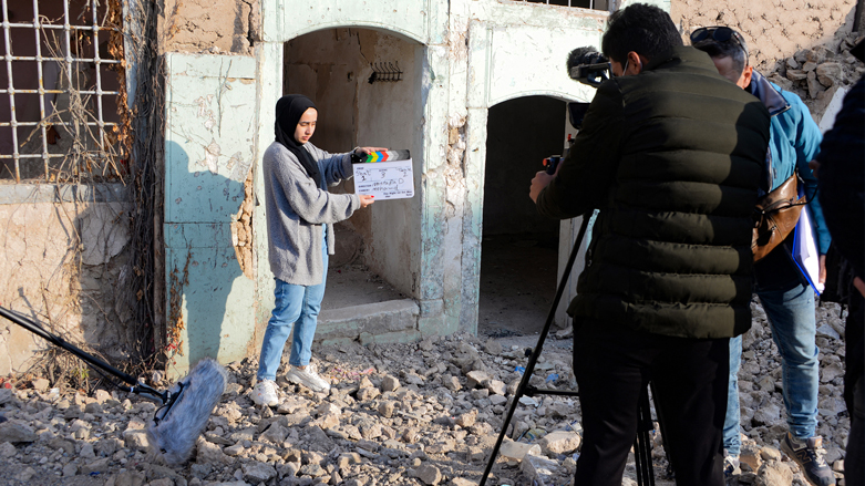 Students of a film school, prepare to shoot a scene, in the war-ravaged northern Iraqi city of Mosul, Dec. 15, 2021. (Photo: Zaid al-Obeidi/AFP)