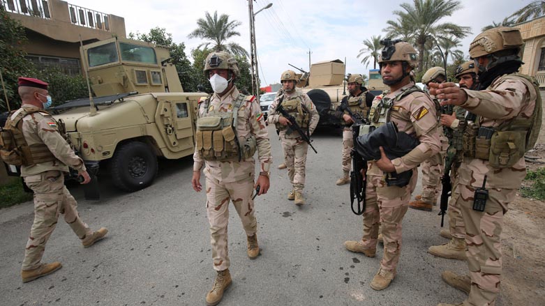 Iraqi forces search the area in Tarmiyah, 35 kilometres (20 miles) north of Baghdad following clashes with Islamic State group fighters, Feb. 20, 2021. (Photo: Ahmad al-Rubaye/AFP)