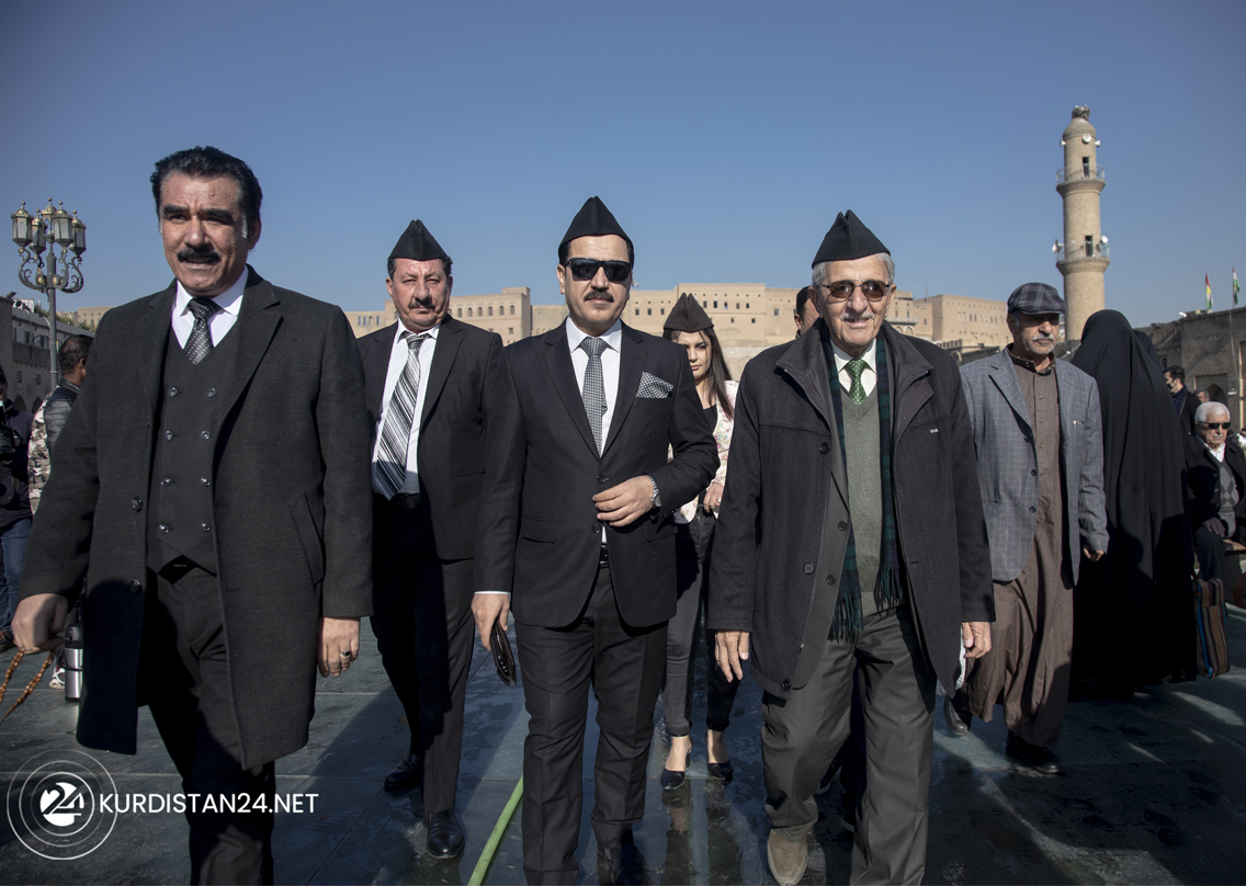 Erbil resident wearing Al-Sidara hats, Dec. 28, 2021. (Photo: Hoger Birazhi/Erbil Museum and Archives of Education)