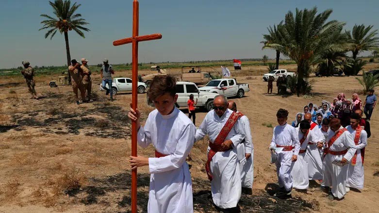 Iraqi Christians attend Mass at the archaeological site of Kokheh Church, south of Baghdad on Aug 23, 2019. (Photo: AP)