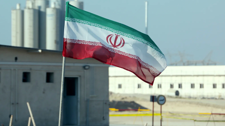 A picture taken on November 10, 2019, shows an Iranian flag at Bushehr nuclear power plant during an official ceremony to kick-start work on a second reactor at the facility (Photo: Atta Kenare/AFP via Getty Images)