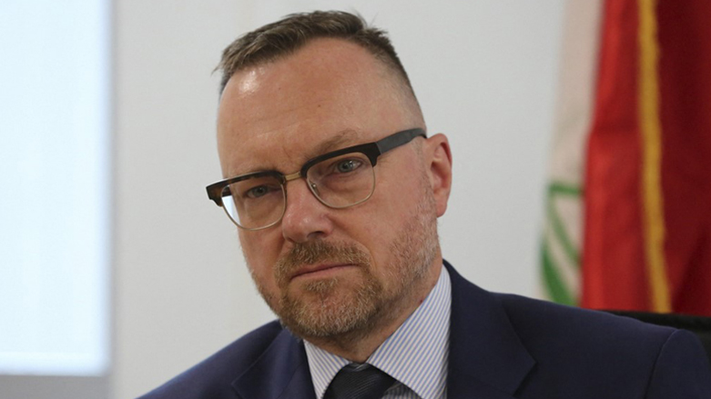 Head of the United Nations Investigative Team to promote Accountability for Crimes Committed by Daesh/ISIL (UNITAD) Christian Ritscher, speaks during an interview at his offices in Baghdad, Nov. 14, 2022. (Photo: Sabah Arar/AFP)