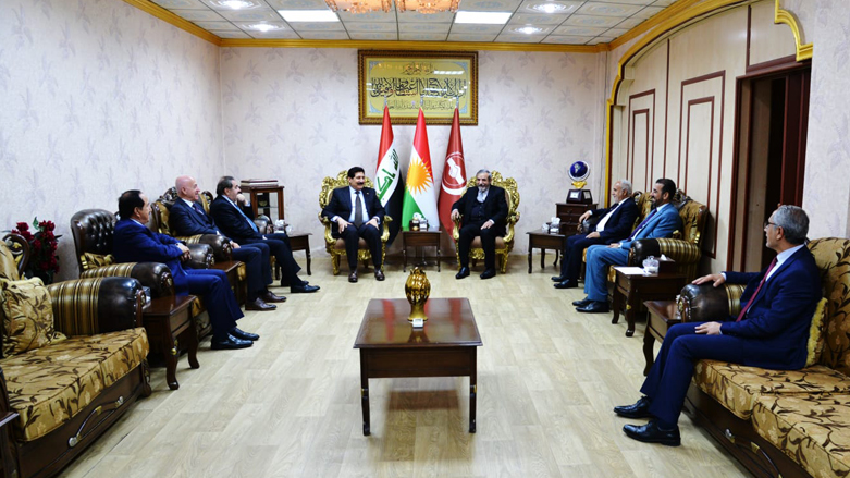 Members of the KDP delegation (left) during their meeting with the Islamic Union of Kurdistan (KIU) party leader and senior members, Dec. 14, 2022. (Photo: KIU)