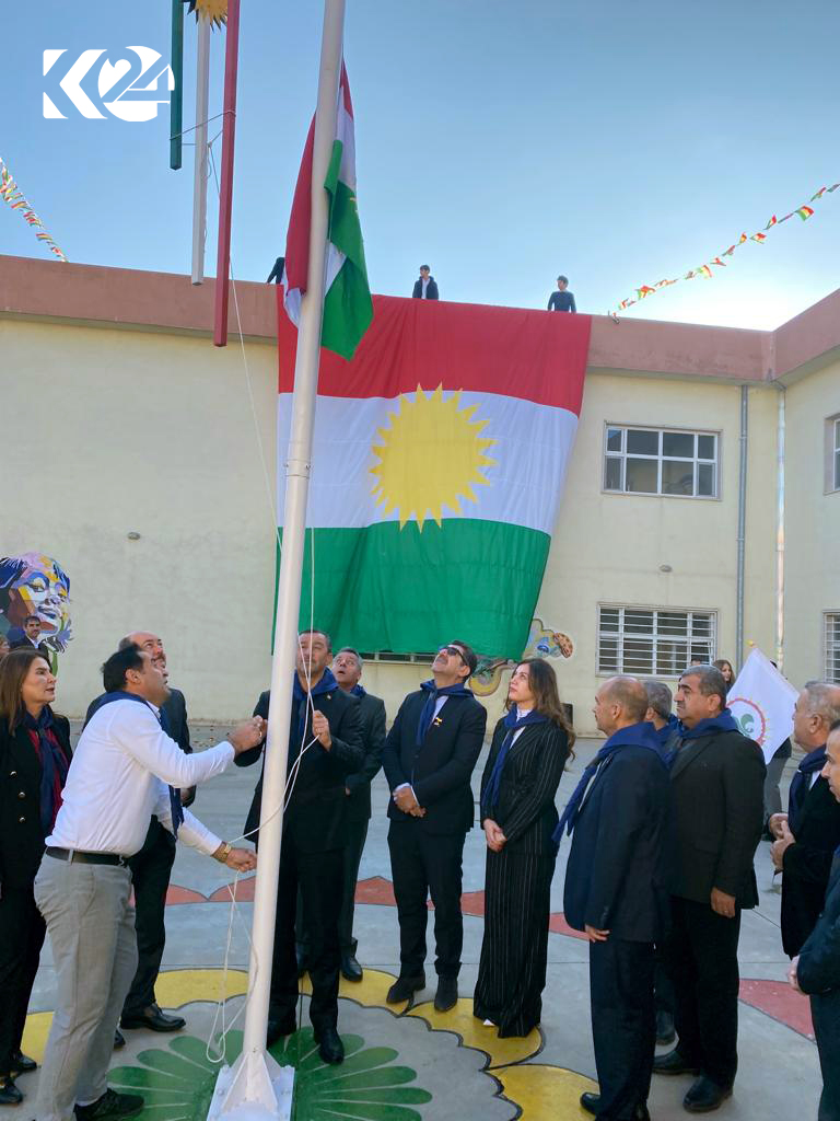 Teachers raising Kurdistan flag day in Erbil, Dec. 17, 2022. (Photo: Kurdistan 24)
