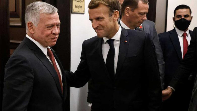 French President Emmanuel Macron meets Jordan's King Abdullah II (L) during the "Baghdad I" summit in the Iraqi capital on August 28, 2021. (Photo: AFP)