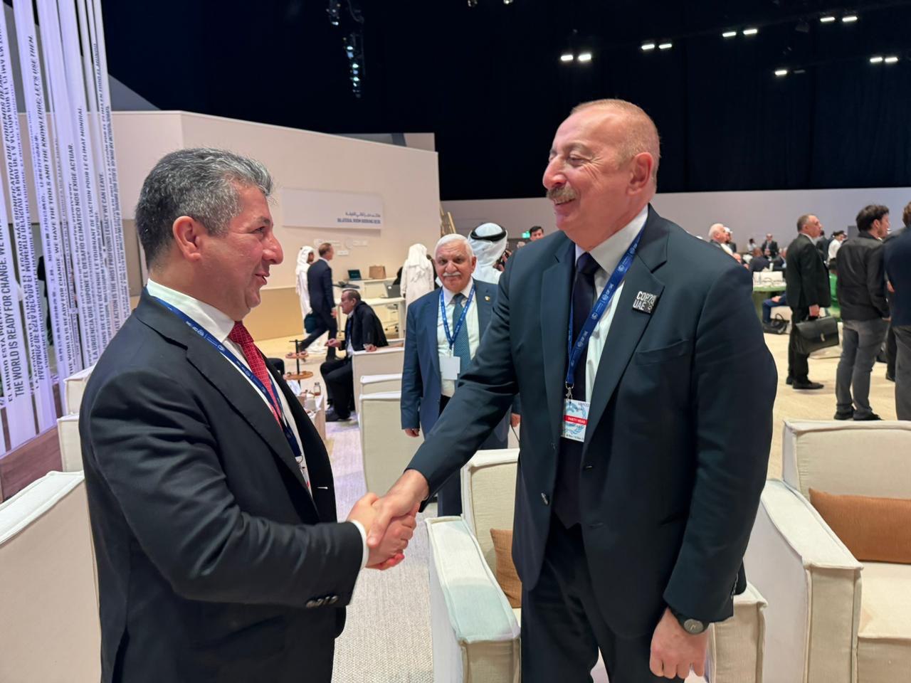 Kurdistan Region Prime Minister Masrour Barzani (left) shaking hands with Ilham Aliyev, President of Azerbaijan, Dec. 1, 2023. (Photo: KRG)