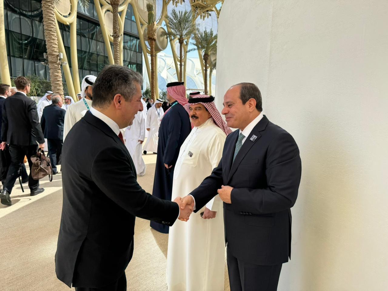 Kurdistan Region Prime Minister Masrour Barzani (left) shaking hands with President of Egypt, Abdelfattah Elsisi, Dec. 1, 2023. (Photo: KRG)
