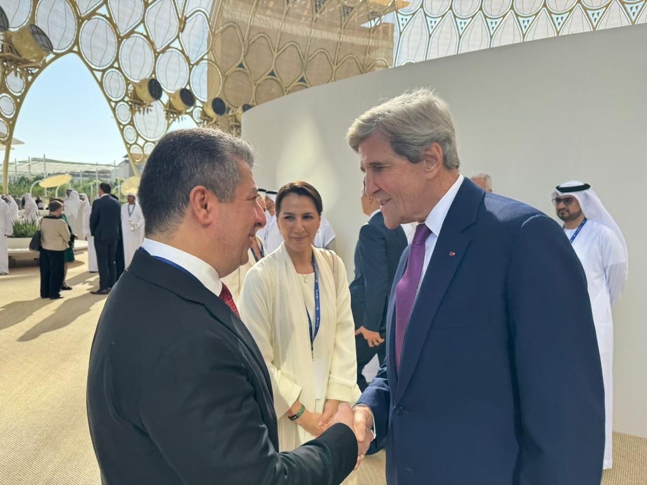 Kurdistan Region Prime Minister Masrour Barzani (left) shaking hands with John Kerry, US Special Presidential Envoy for Climate, Dec. 1, 2023. (Photo: KRG)
