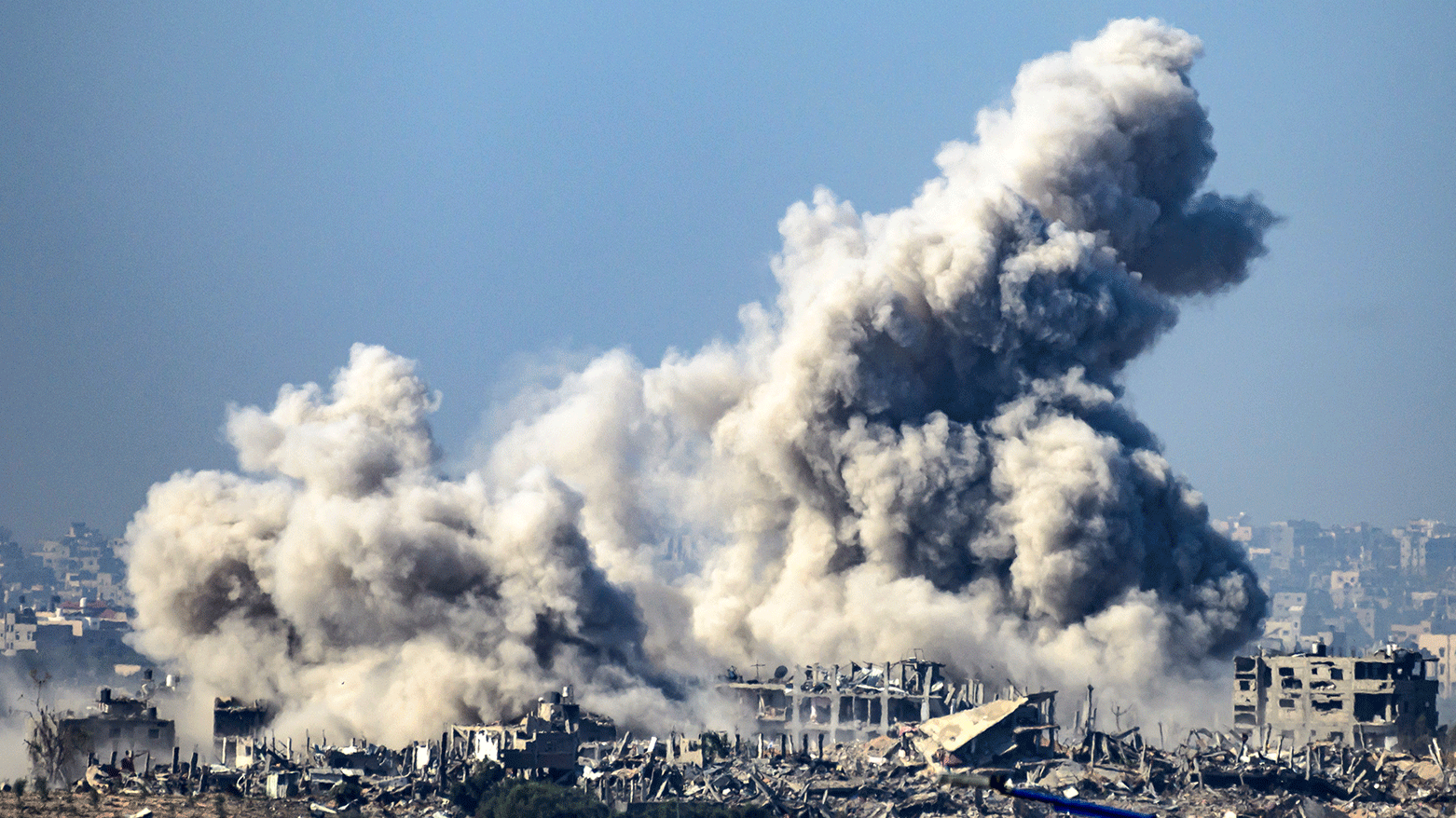 This picture taken from southern Israel near the border with the Gaza Strip shows smoke rising from buildings after being hit by Israeli strikes, as battles resume between Israel and Hamas militants, on December 1, 2023. (Photo: AFP)