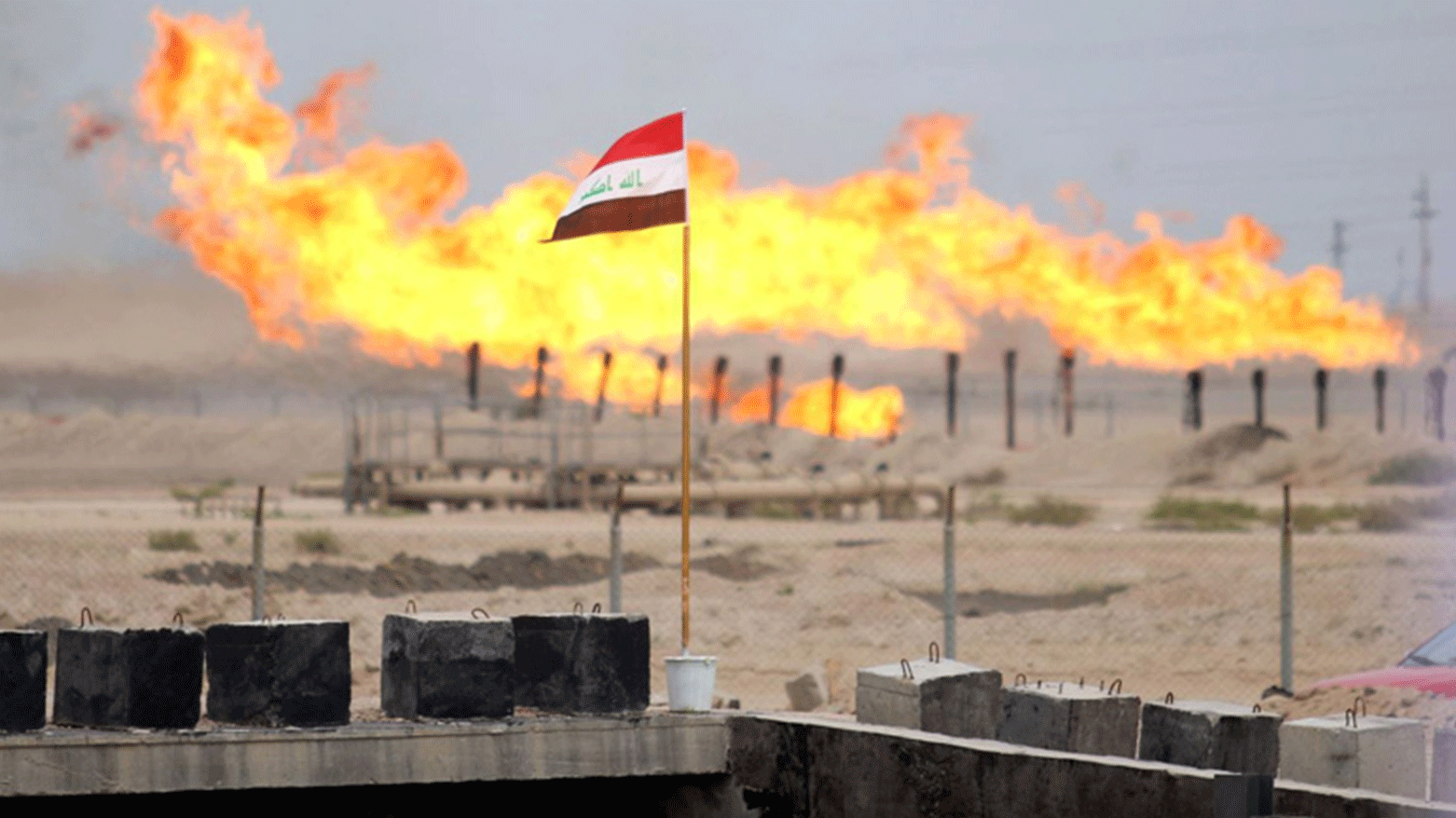 Gas flare burned off at an oil facility in southern oil-rich Basra province, March 3, 2016. (Photo: Hussein Faleh/AFP)