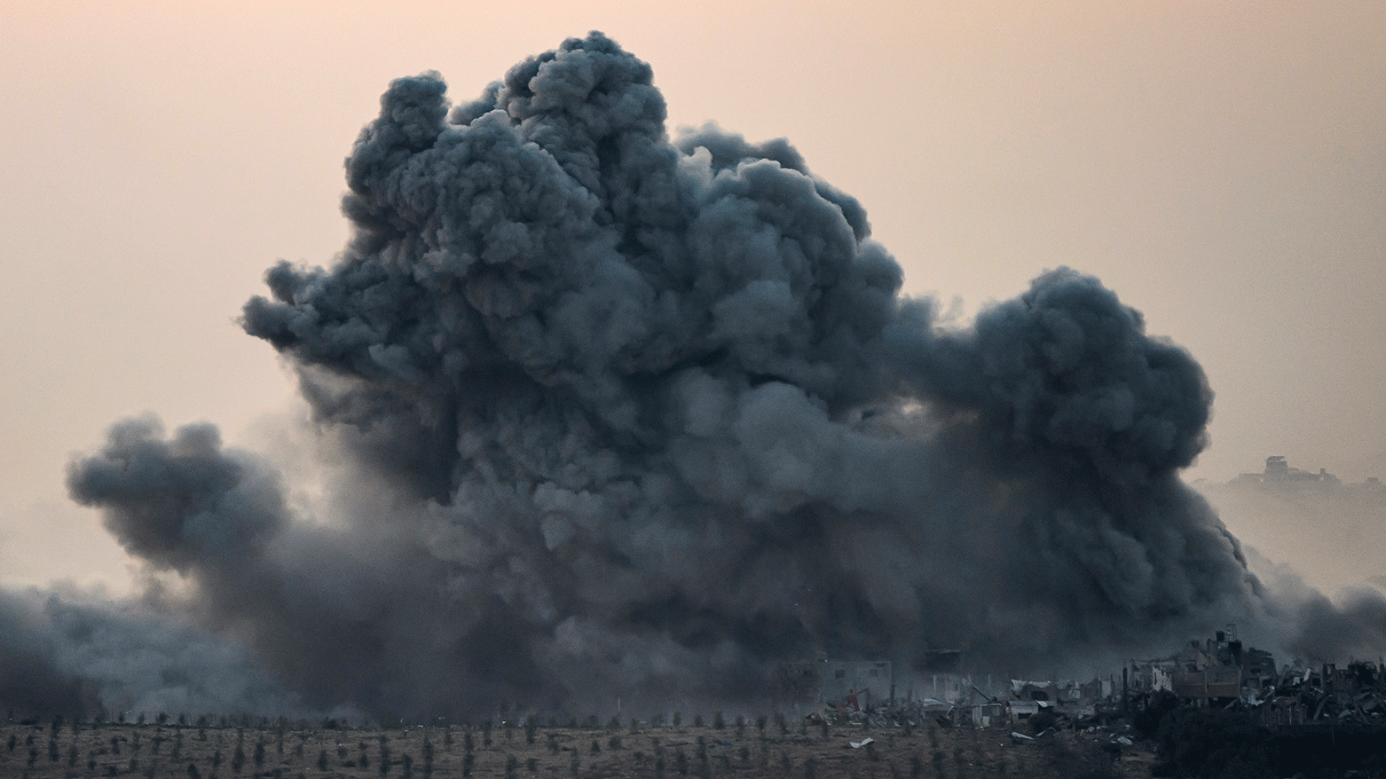 Smoke rising from buildings after being hit by Israeli strikes, after battles resumed between Israel and Hamas militants, on December 2, 2023. (Photo: AFP)