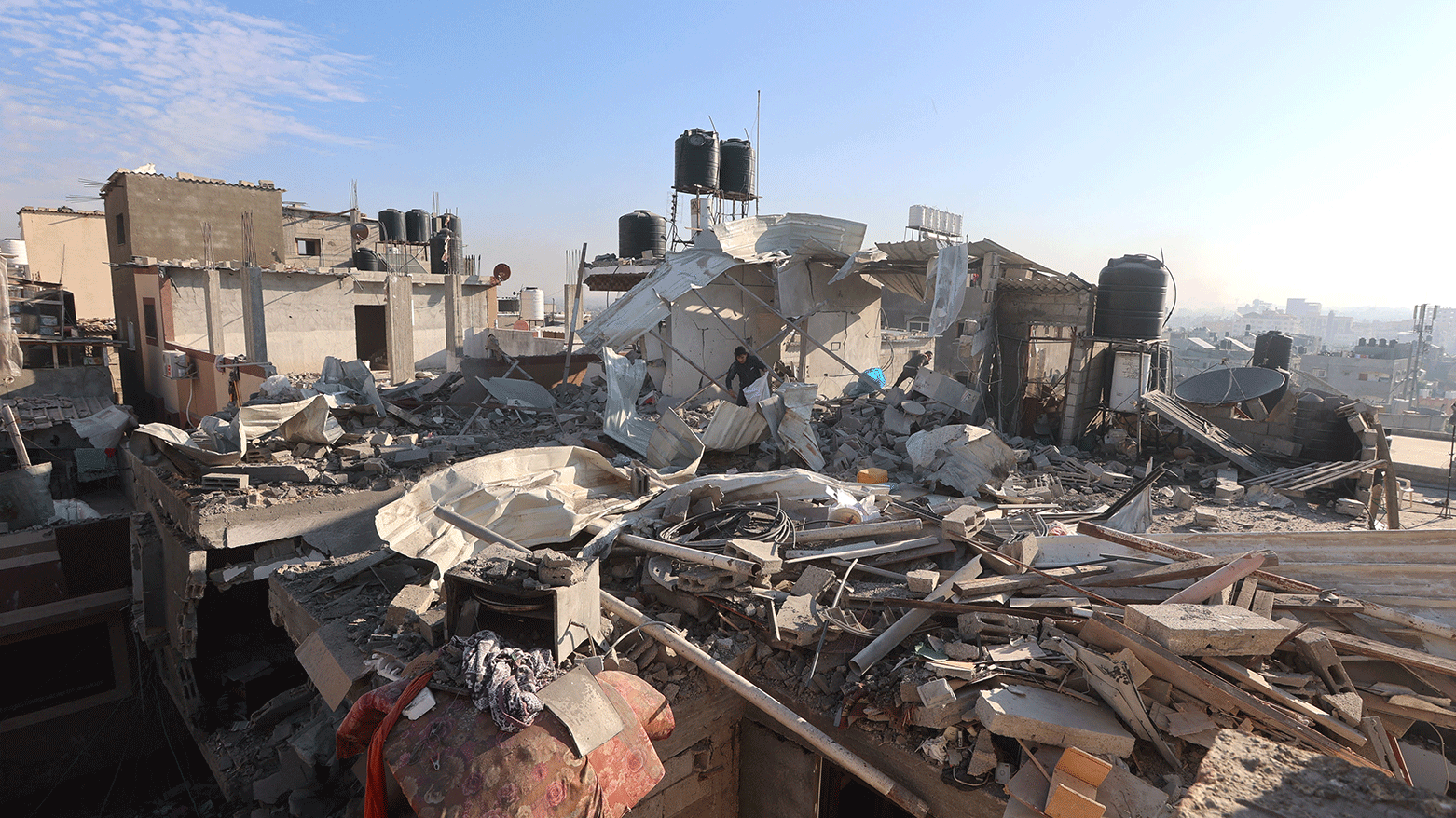 Palestinians check the rubble following Israeli bombardment on Khan Yunis in the southern Gaza Strip on December 8, 2023. (Photo: AFP)