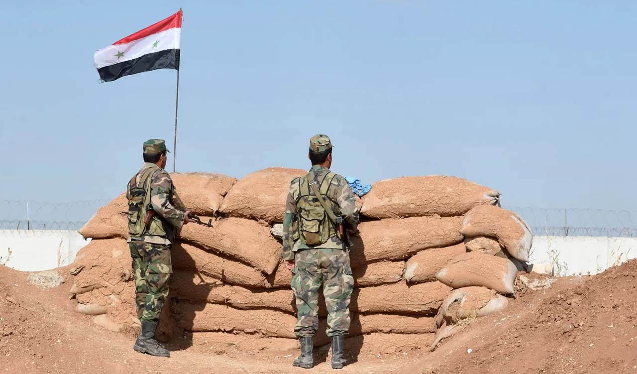 Syrian regime forces manning a position in the countryside city of Kobane, also known as Ain al-Arab, along the border with Turkey. (Photo: AFP)