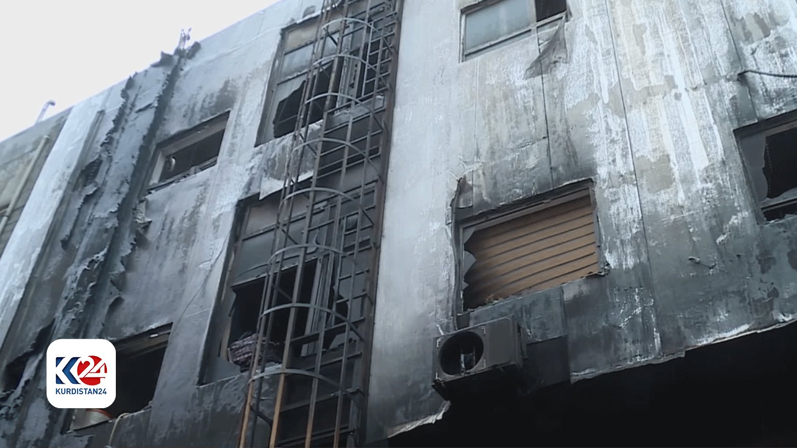 The exterior of burned down facade of the residential building, in which at least 14 were killed on Friday night, Dec. 9, 2023. (Photo: Rahand Mohammad/Kurdistan 24)