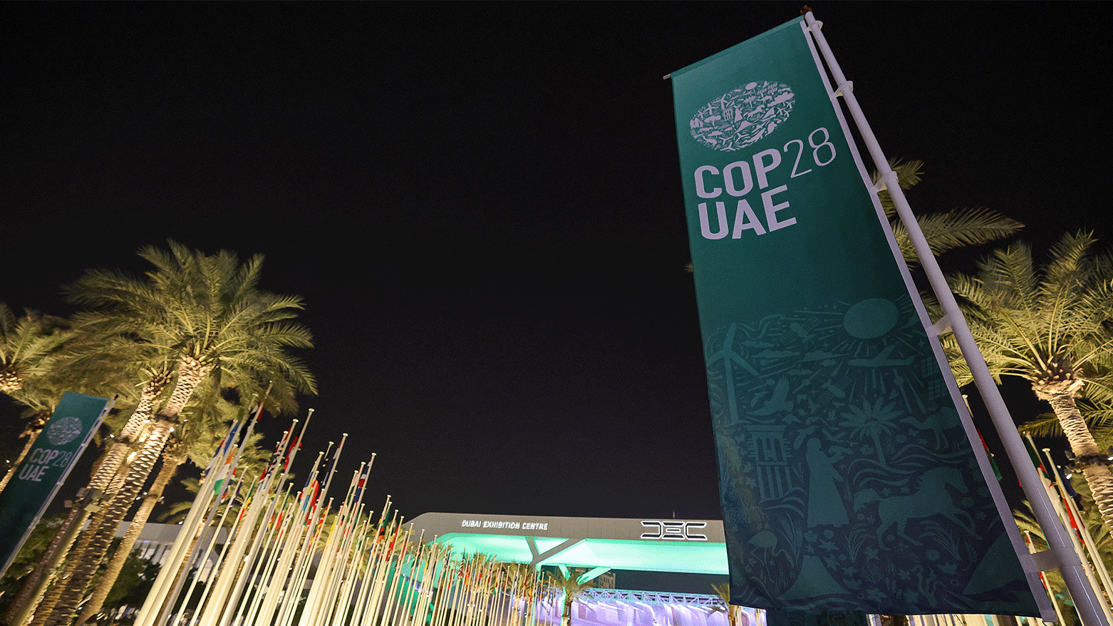 People walk outside Expo City in Dubai on December 12, 2023, during the United Nations Climate Change Conference COP28. (Photo: AFP)