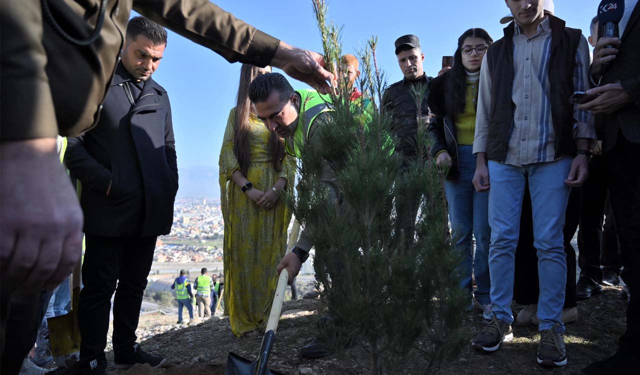 Head of Zakho Independent Administration Guhdar Sheekhoo (center) is pictured during the first phase of a one-million tree planting campaign in Zakho district, Dec. 14, 2023. (Photo: Zakho Independent Administration)