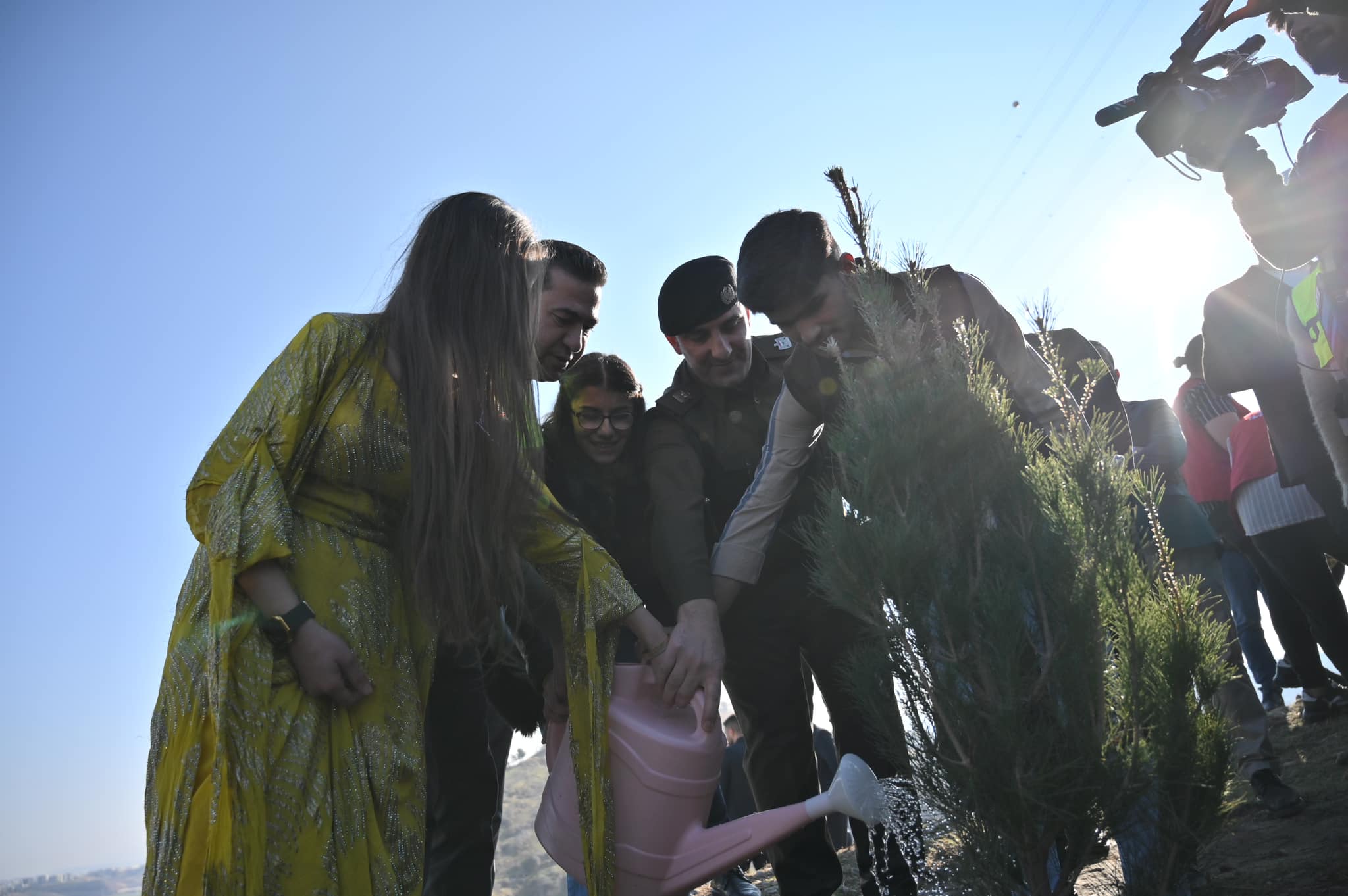 Officials, volunteers pictured during the first phase of a one-million tree planting campaign in Zakho district, Dec. 14, 2023. (Photo: Zakho Independent Administration)