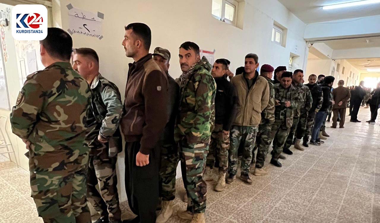 Kurdish members of the security forces from disputed territories cast waiting to cast their ballots at a polling station in Erbil, Dec. 16, 2023. (Photo: Azar Farooq/Kurdistan24)