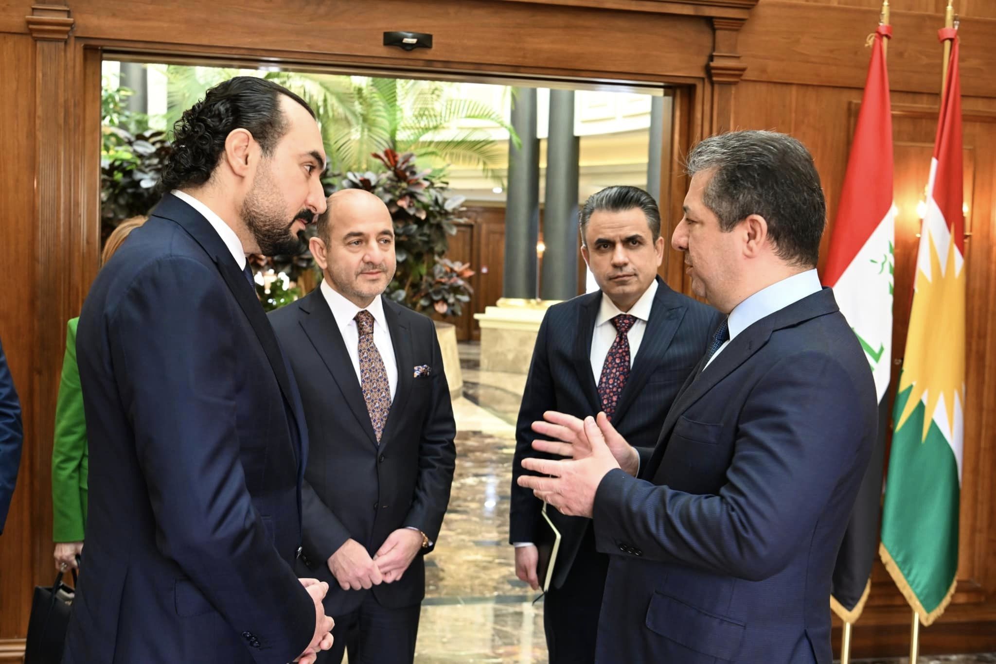 Kurdistan Region Prime Minister Masrour Barzani (right) talking with Ziyad Khalaf Abed Kareem (left), the International Development Bank’s chairman of the board of directors, in Erbil, Dec. 19, 2023. (Photo: KRG)