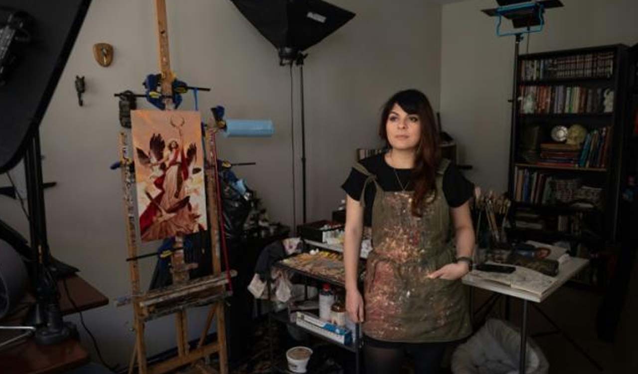 Artists such as Karla Ortiz in San Francisco, California, are seeking technical and legal ways to protect their styles as artificial intelligence 'learns' to copy works found online (Photo: Amy Osborne/AFP))