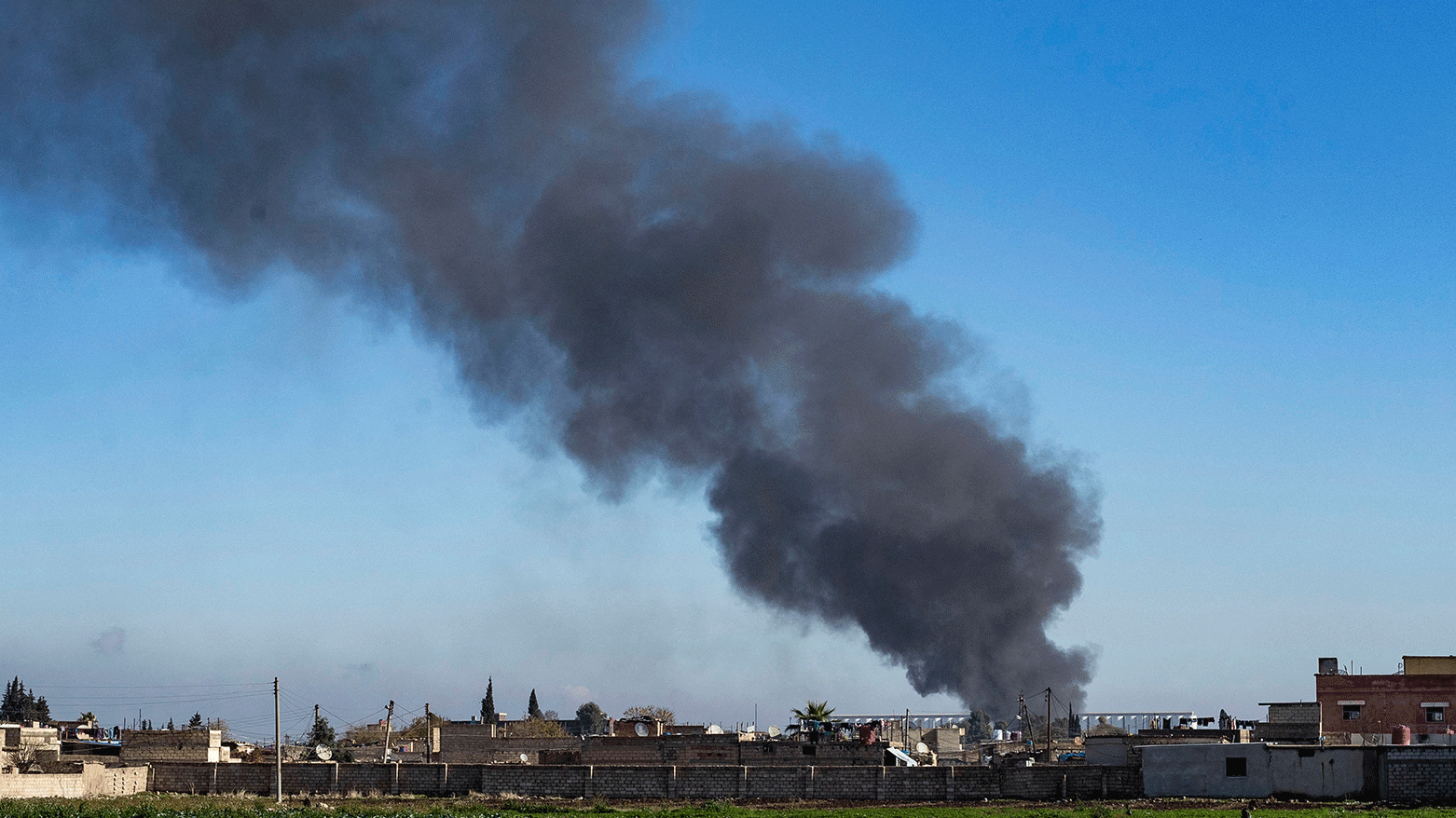 Smokes billows in Qamishli in northeastern Syria close to the Turkish border on December 25, 2023, amid Turkish military strikes in the area. (Photo: AFP)