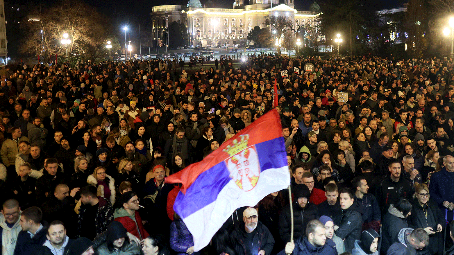 Protesters gather in front of Belgrade's city council building during a demonstration in Belgrade, on December 24, 2023. (Photo: AFP)