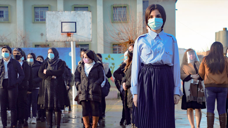 Mask-clad students gather in the courtyard of their school in the northeastern city of Sulaimaniyah, Kurdistan Region. Feb. 7, 2021. (Photo: Shwan Mohammed / AFP)